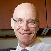 Mark E. Robson